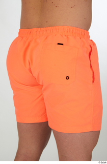 Joel dressed hips orange shorts sports 0006.jpg